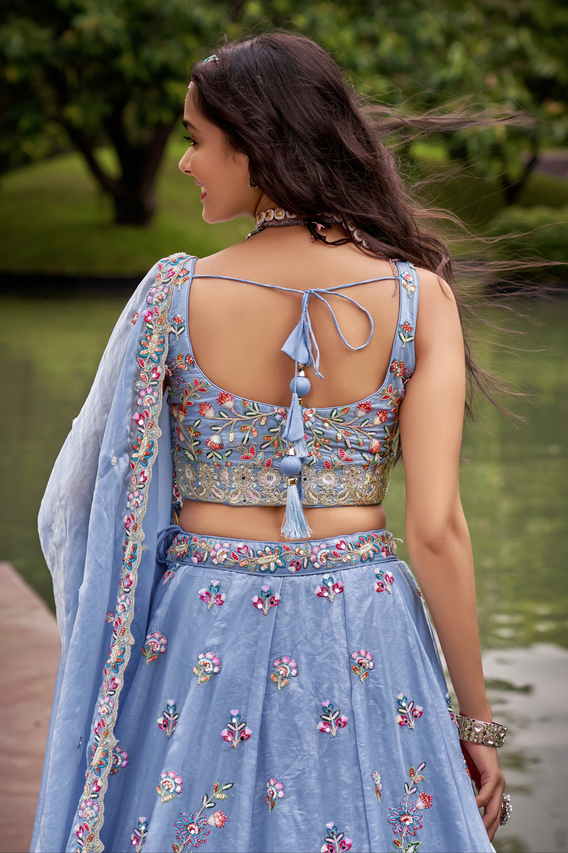 Turquoise Blue Organza Bridal Lehenga with Sequins & Heavy Embroidery