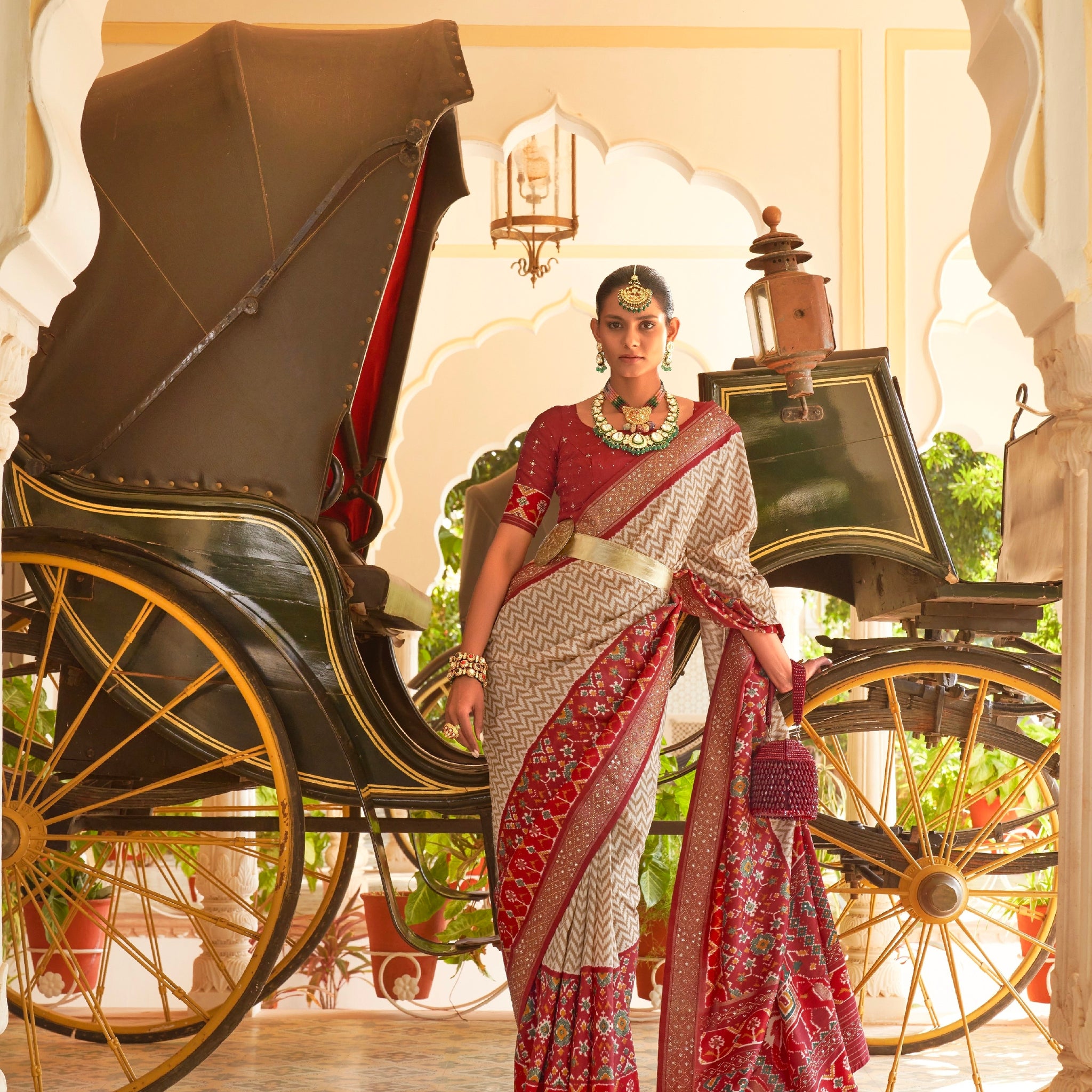 Maroon & White Patola Silk Saree with Silver Border and Elephant Pallu