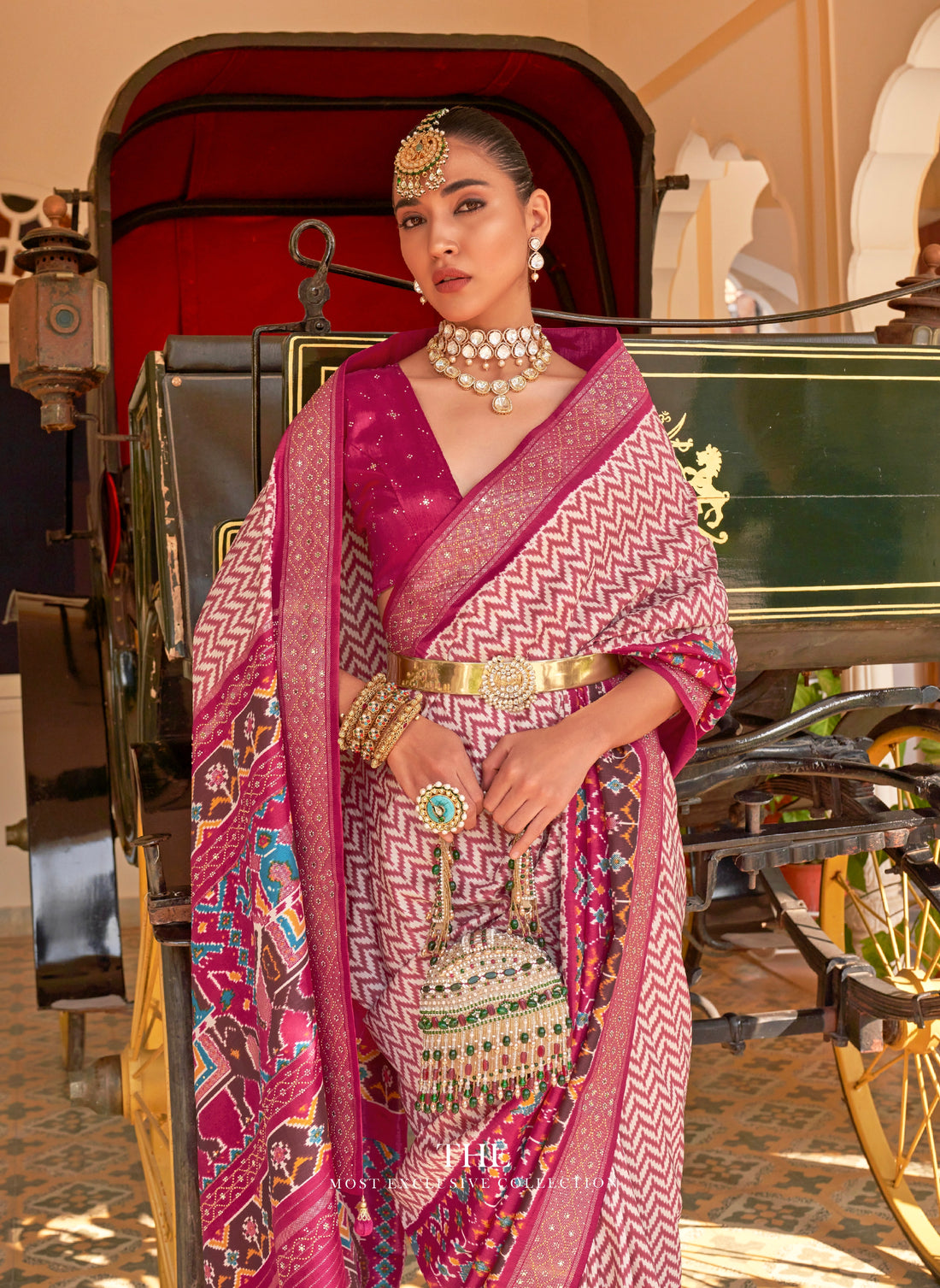 Magenta & Pink Patola Silk Saree with Silver Border and Elephant Pallu