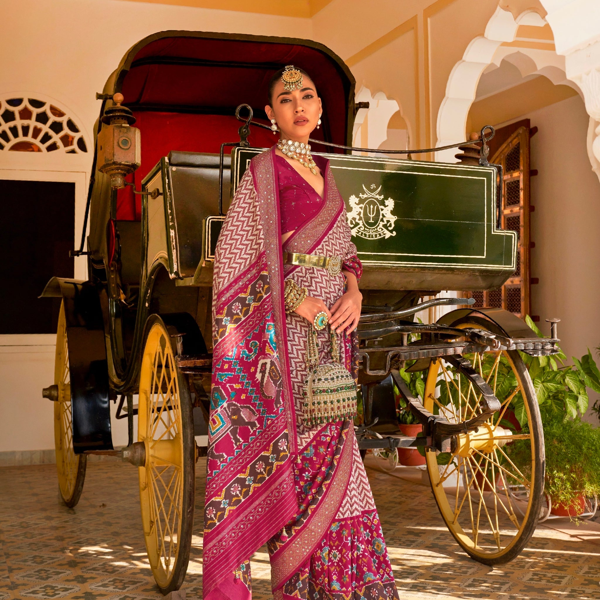 Magenta & Pink Patola Silk Saree with Silver Border and Elephant Pallu