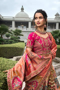 Peach & Coral Banarasi Silk Lehenga Choli with Zarkan Codding Work