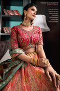 Pink & Green Banarasi Silk Lehenga with Zarkan Codding Work