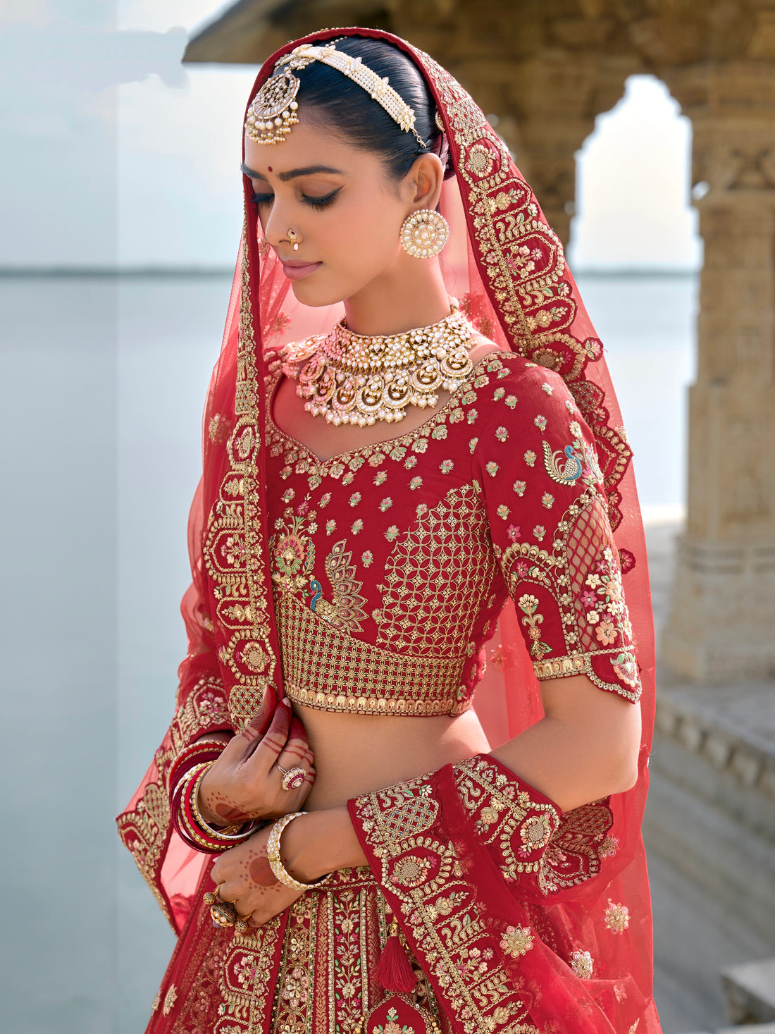 Red Bridal Lehenga with Royal Embroidery and Opulent Detailing