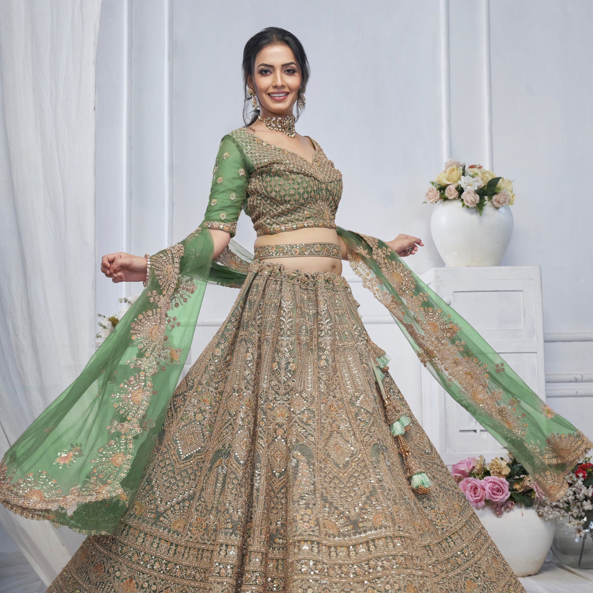 Green Soft Net Lehenga with Paisley & Peacock Embroidery