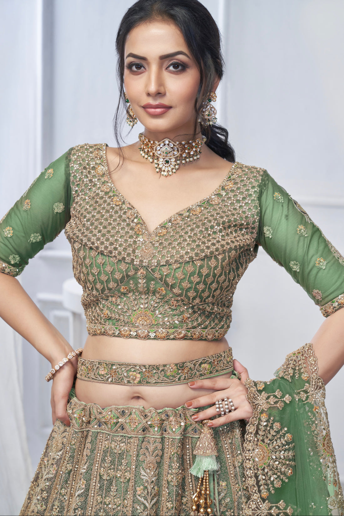 Green Soft Net Lehenga with Paisley & Peacock Embroidery