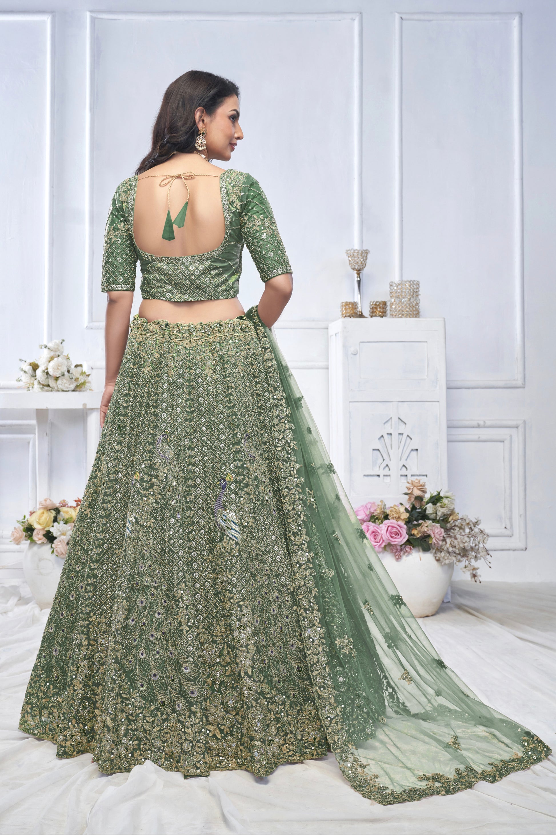 Green Aari Embroidered Soft Net Lehenga with Zari & Stone Work