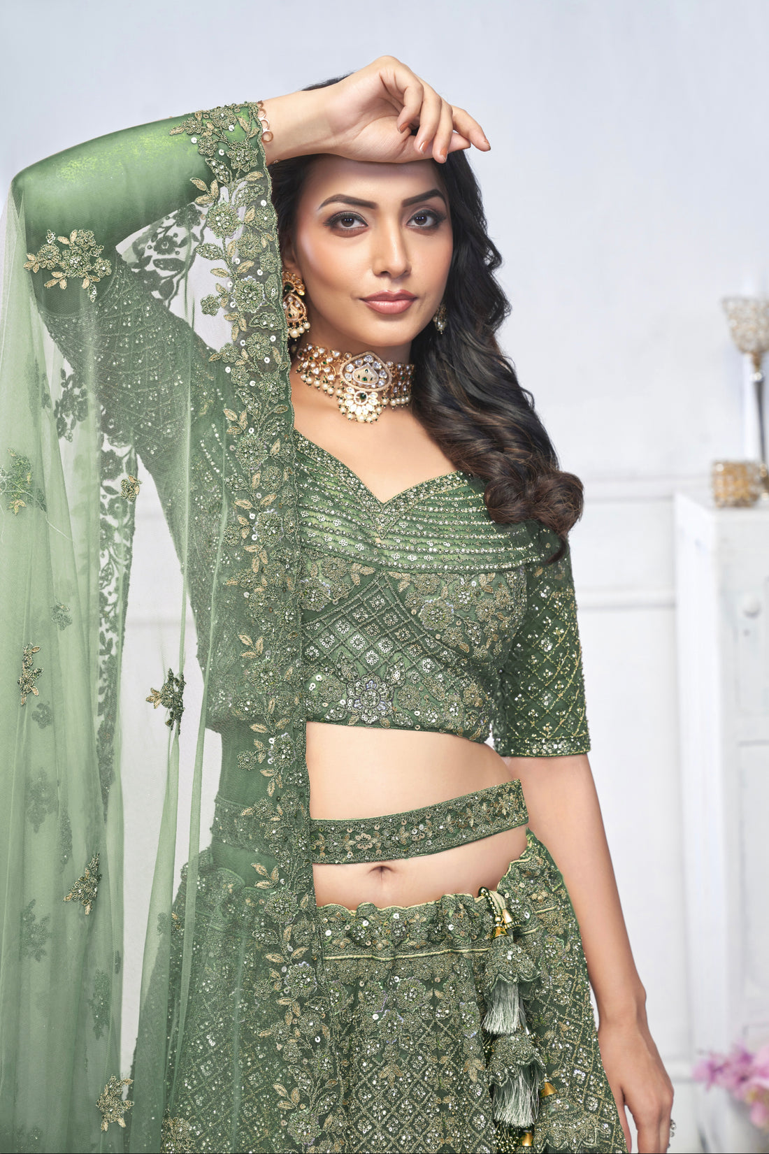 Green Aari Embroidered Soft Net Lehenga with Zari & Stone Work