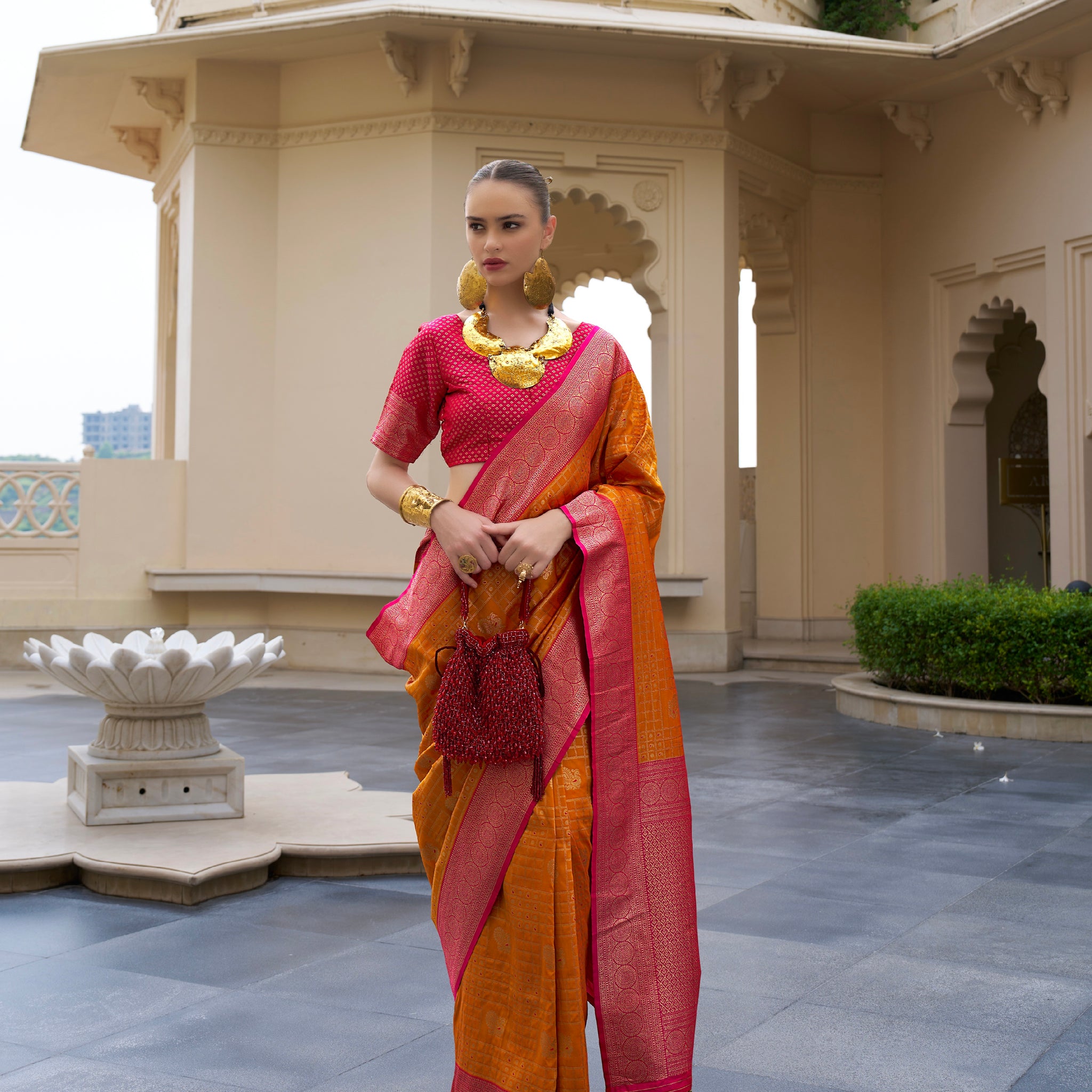 Pink and Yellow Banarasi Silk Saree with Kanchipuram Design