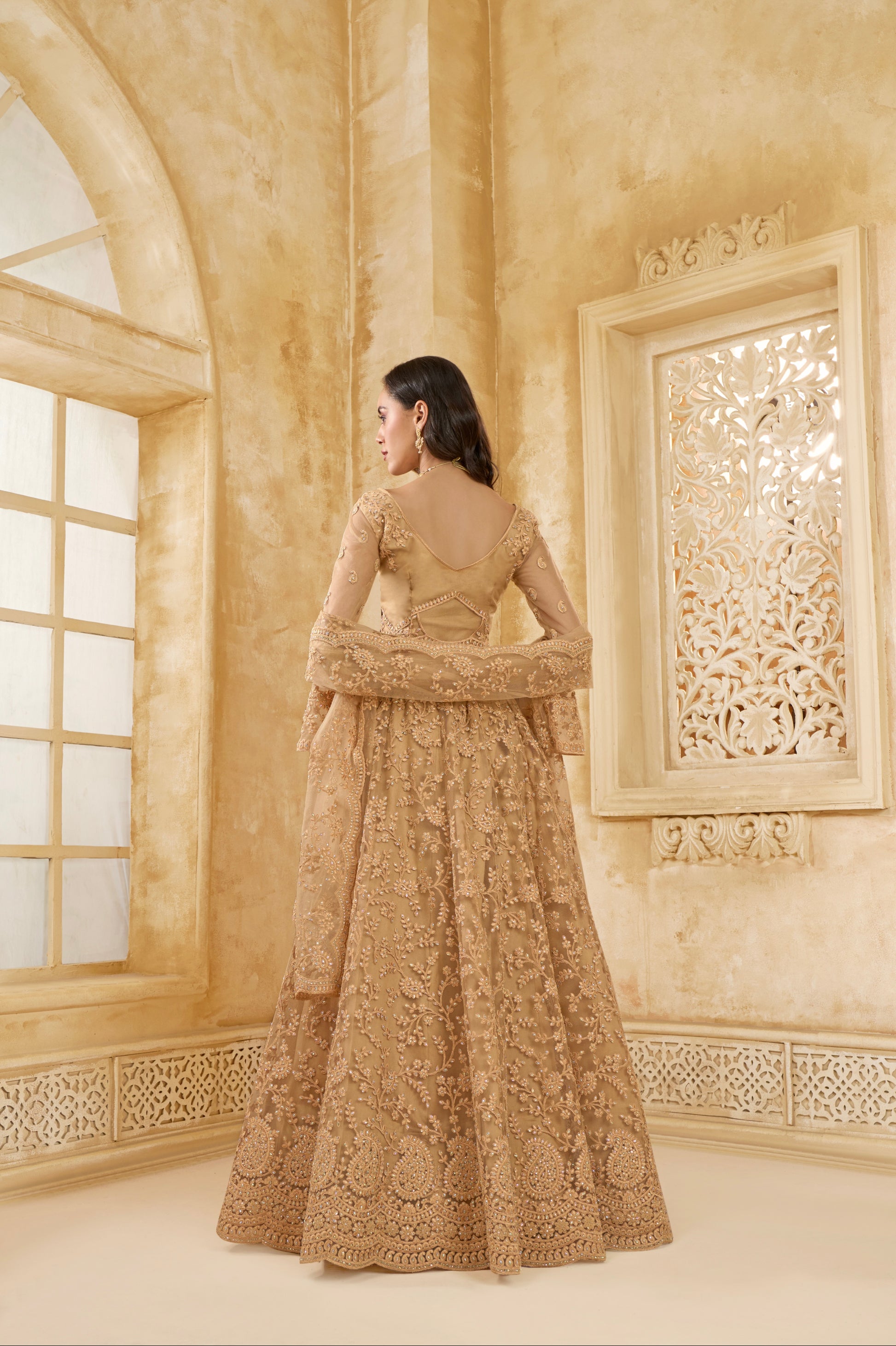 Golden Embellished Lehenga Choli with Intricate Threadwork & Stones