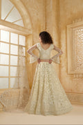 Ivory Net Bridal Lehenga Choli with All-Over Stone & Thread Embroidery