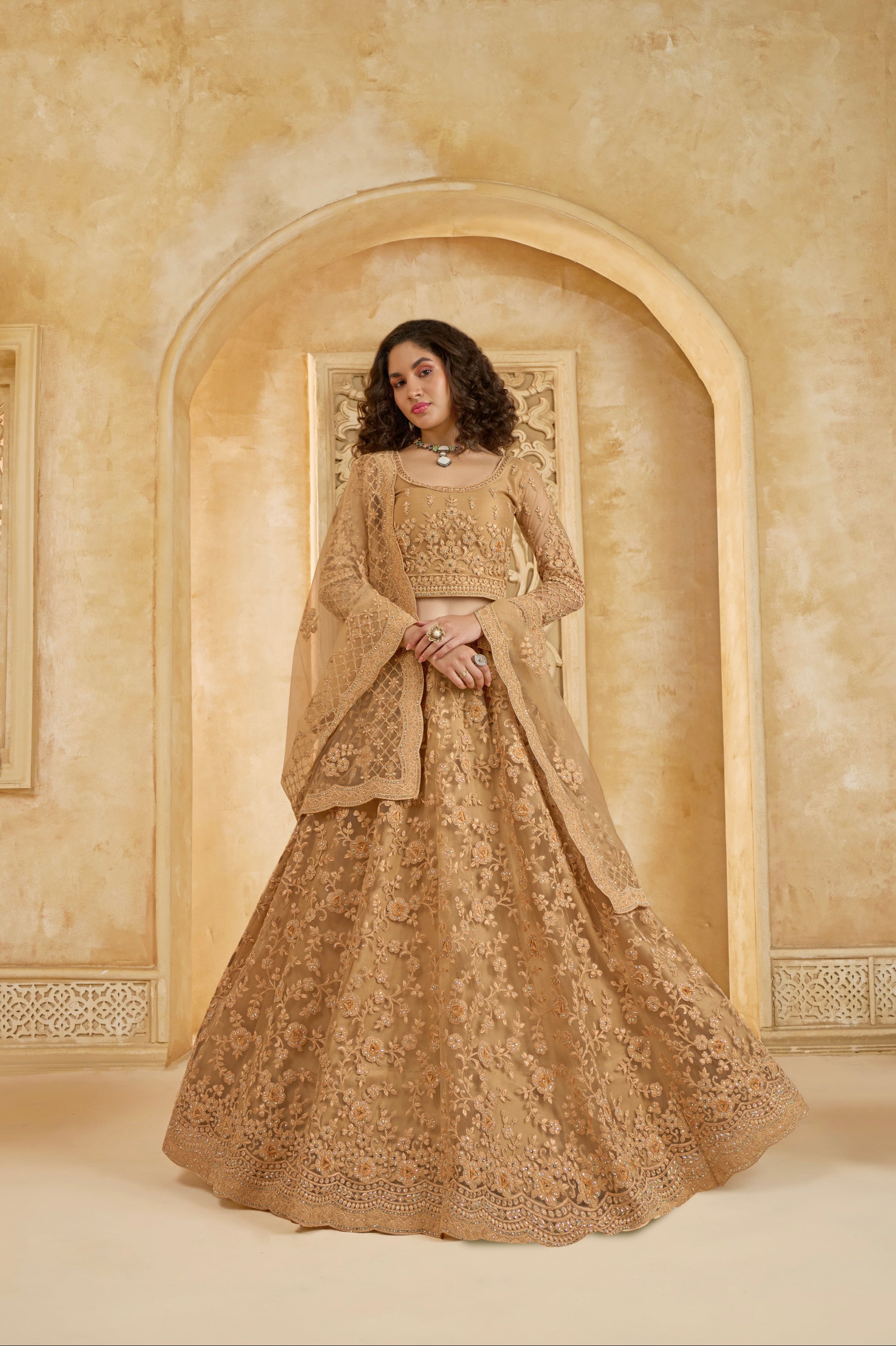 Golden Bridal Lehenga Choli with Stone-Studded Embroidery