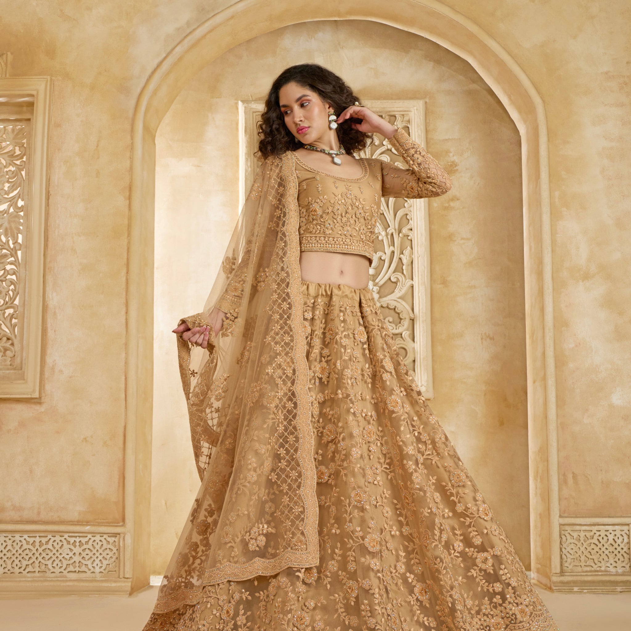 Golden Bridal Lehenga Choli with Stone-Studded Embroidery