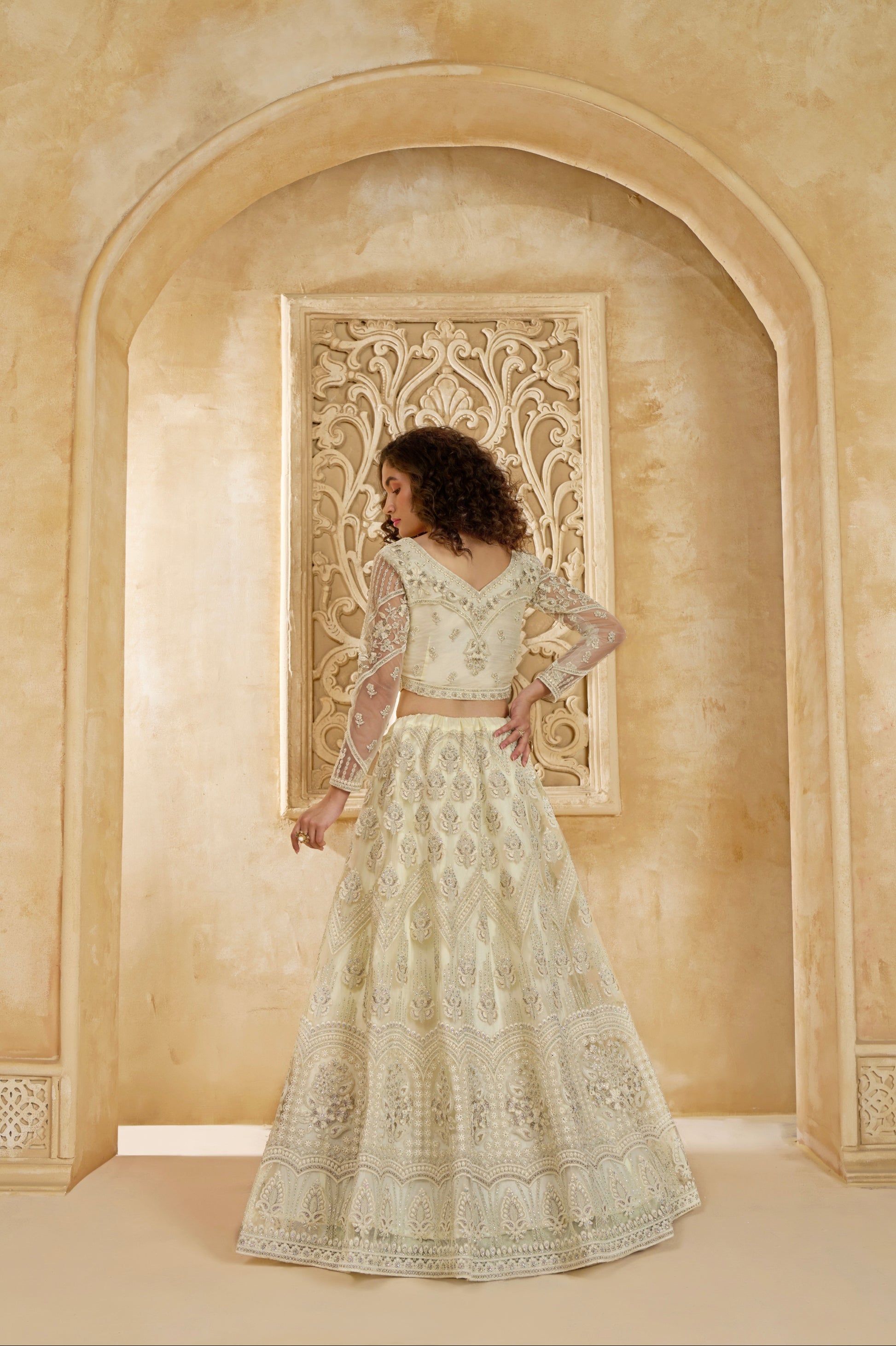 Ivory Net Lehenga Choli with Heavy Embroidery & Stonework