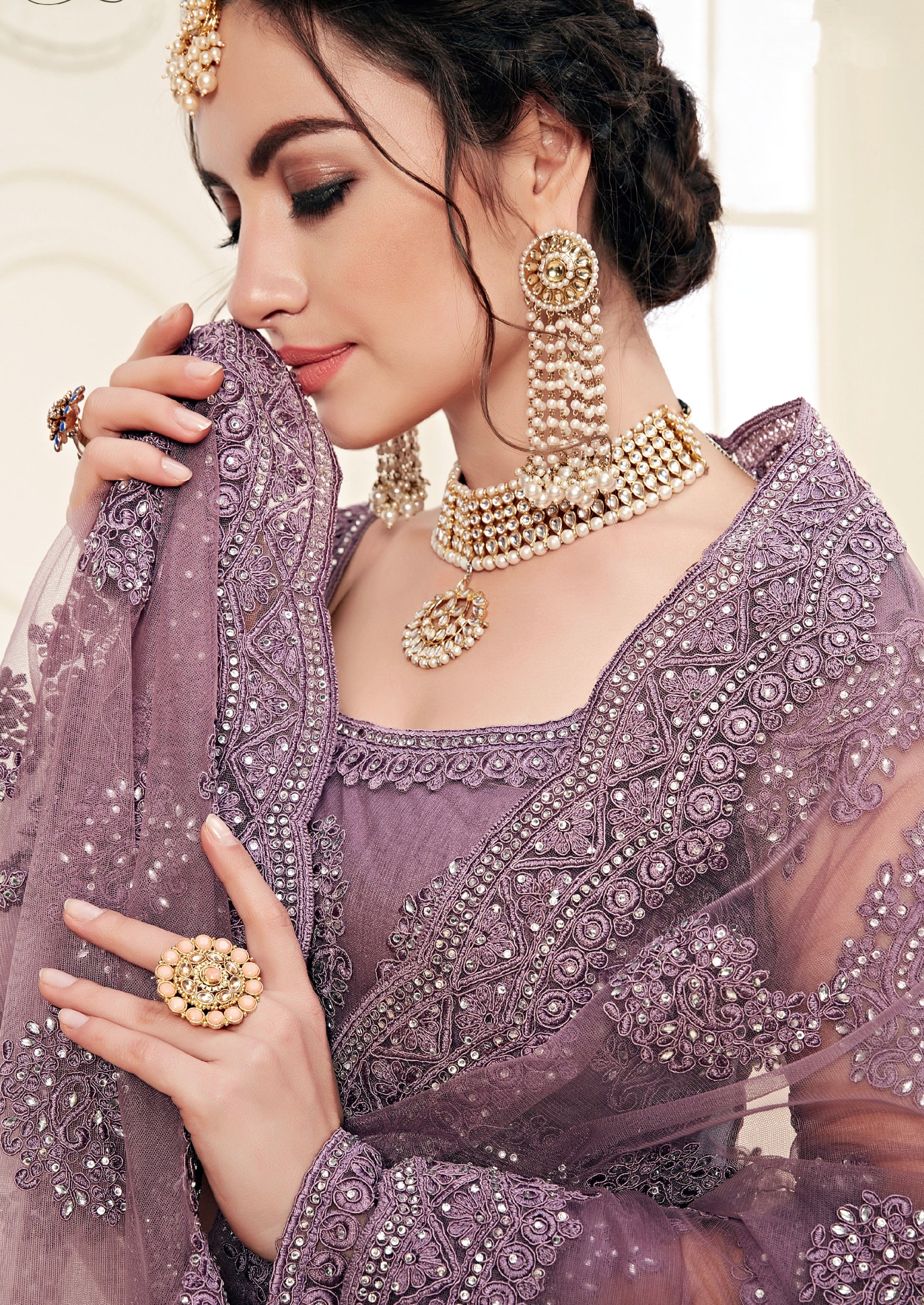 Violet Net Lehenga with Heavy Embroidery and Stone Work