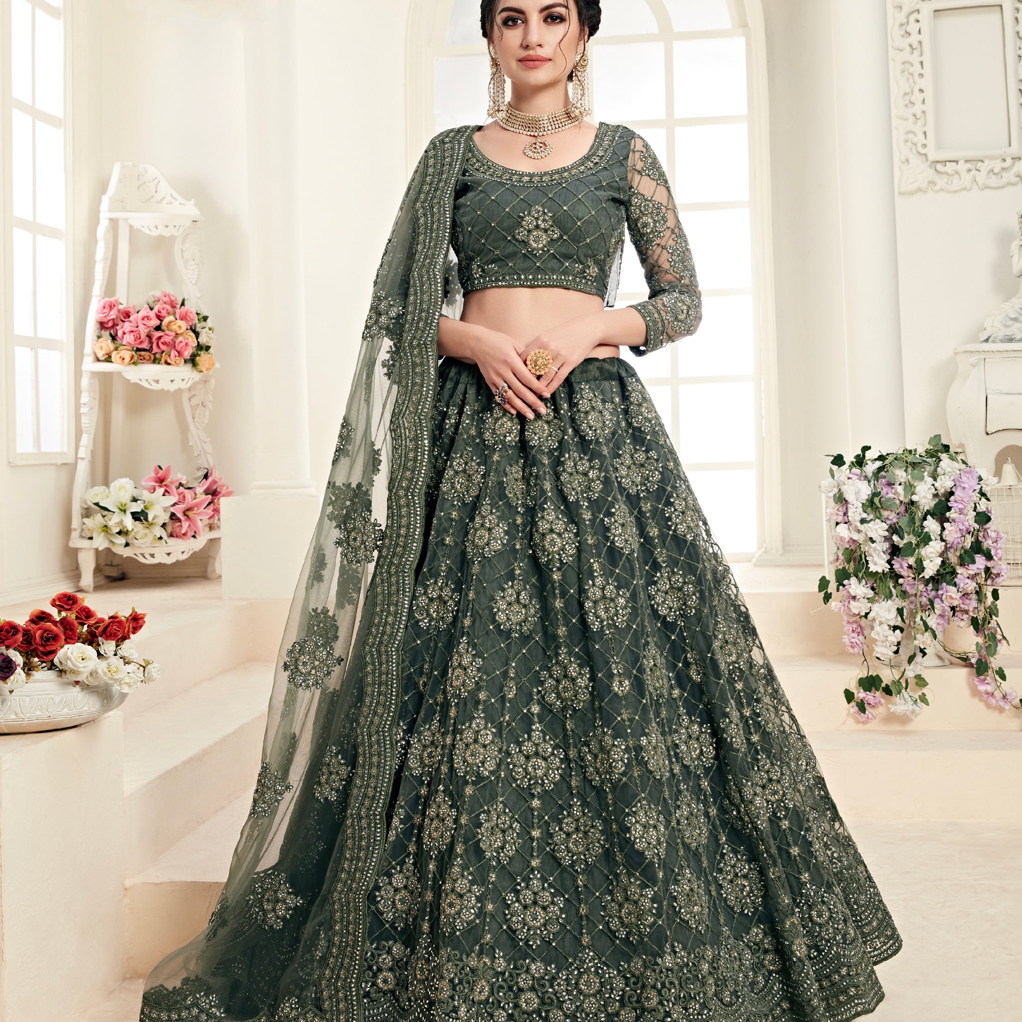 Green Net Lehenga with Heavy Threadwork and Stone Embellishments