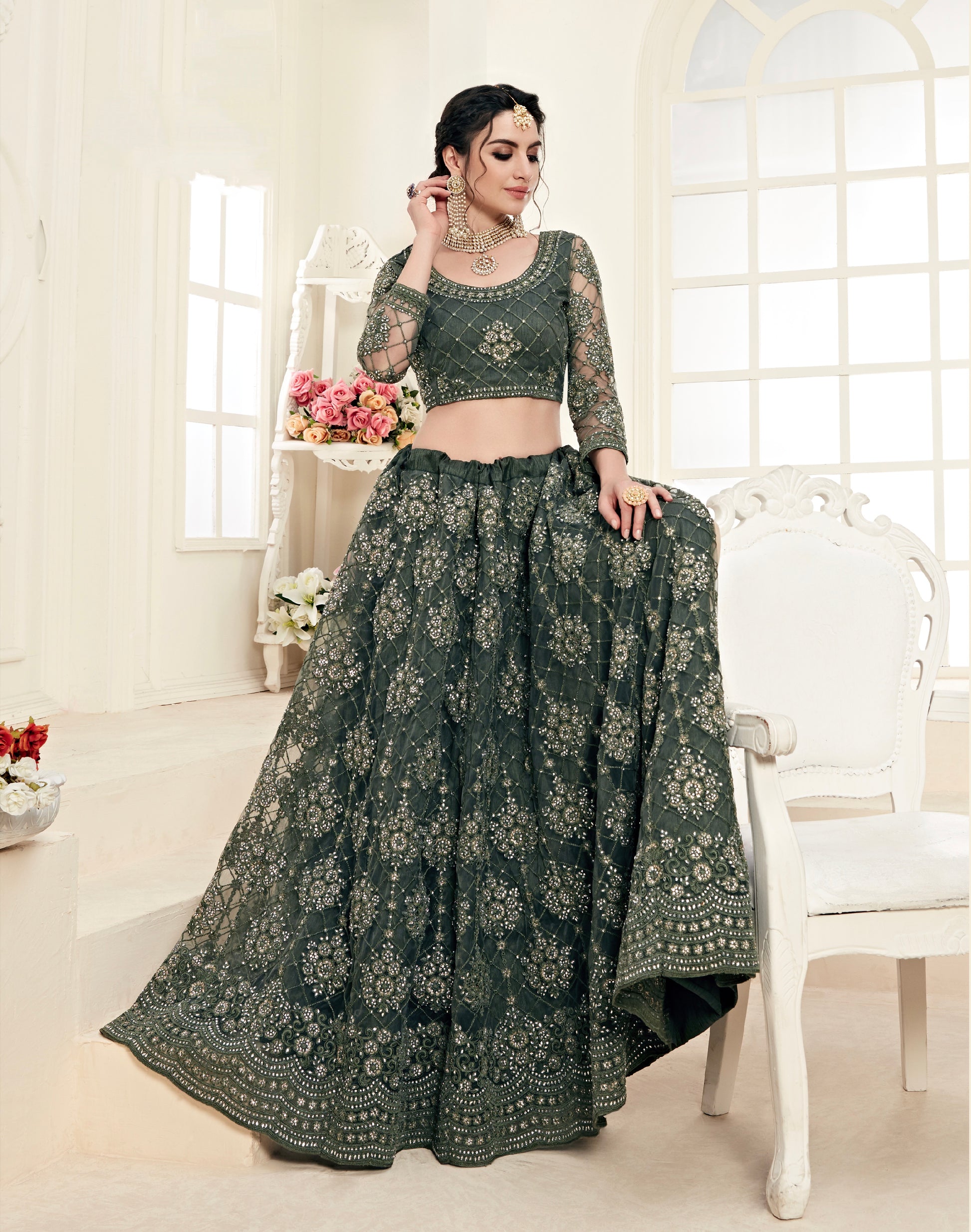 Green Net Lehenga with Heavy Threadwork and Stone Embellishments