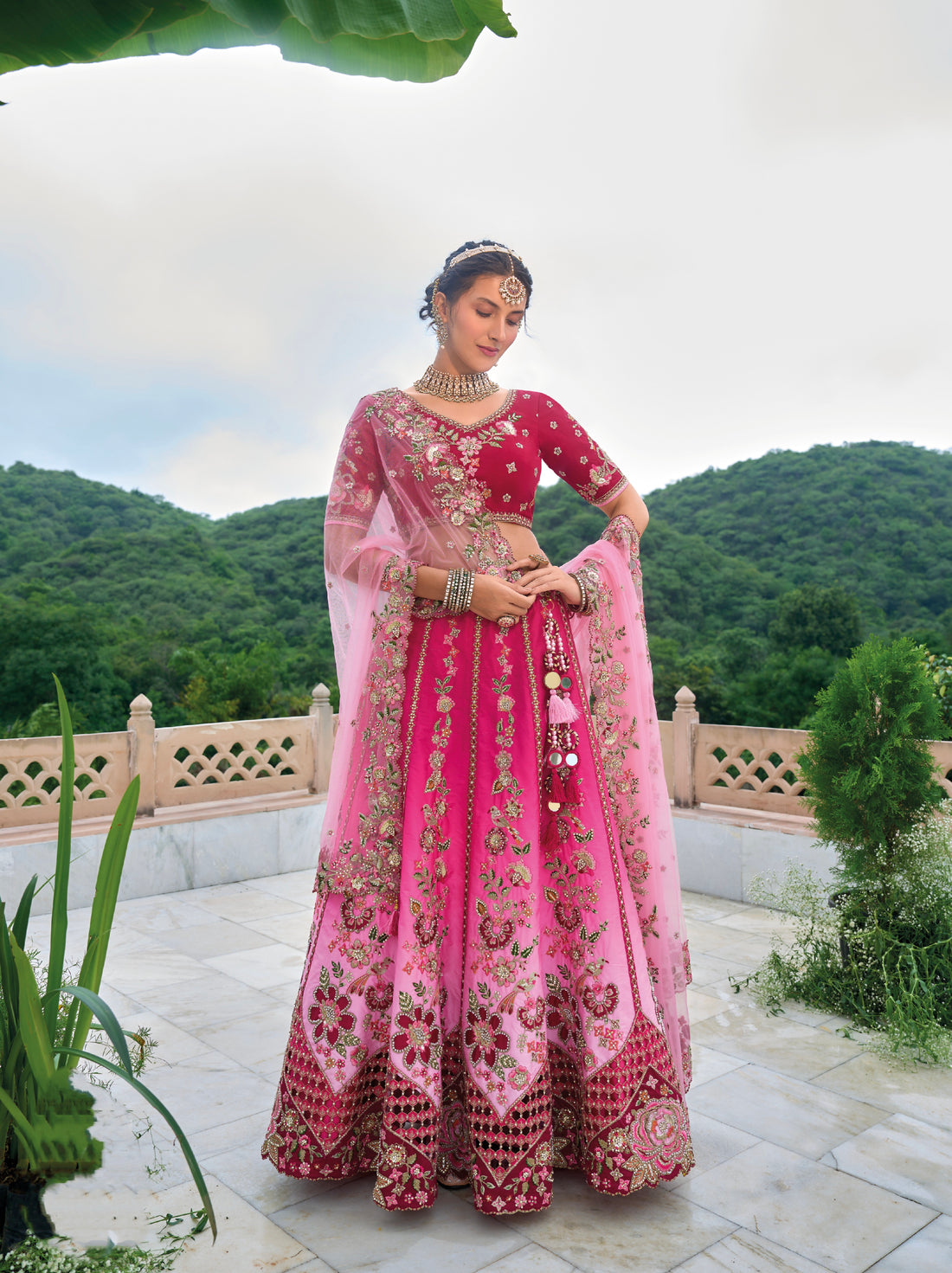 Magenta Pink Velvet Bridal Lehenga Choli with Heavy Embellishments