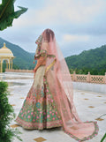 Soft Peach and Green Floral Lehenga with Pastel Hues