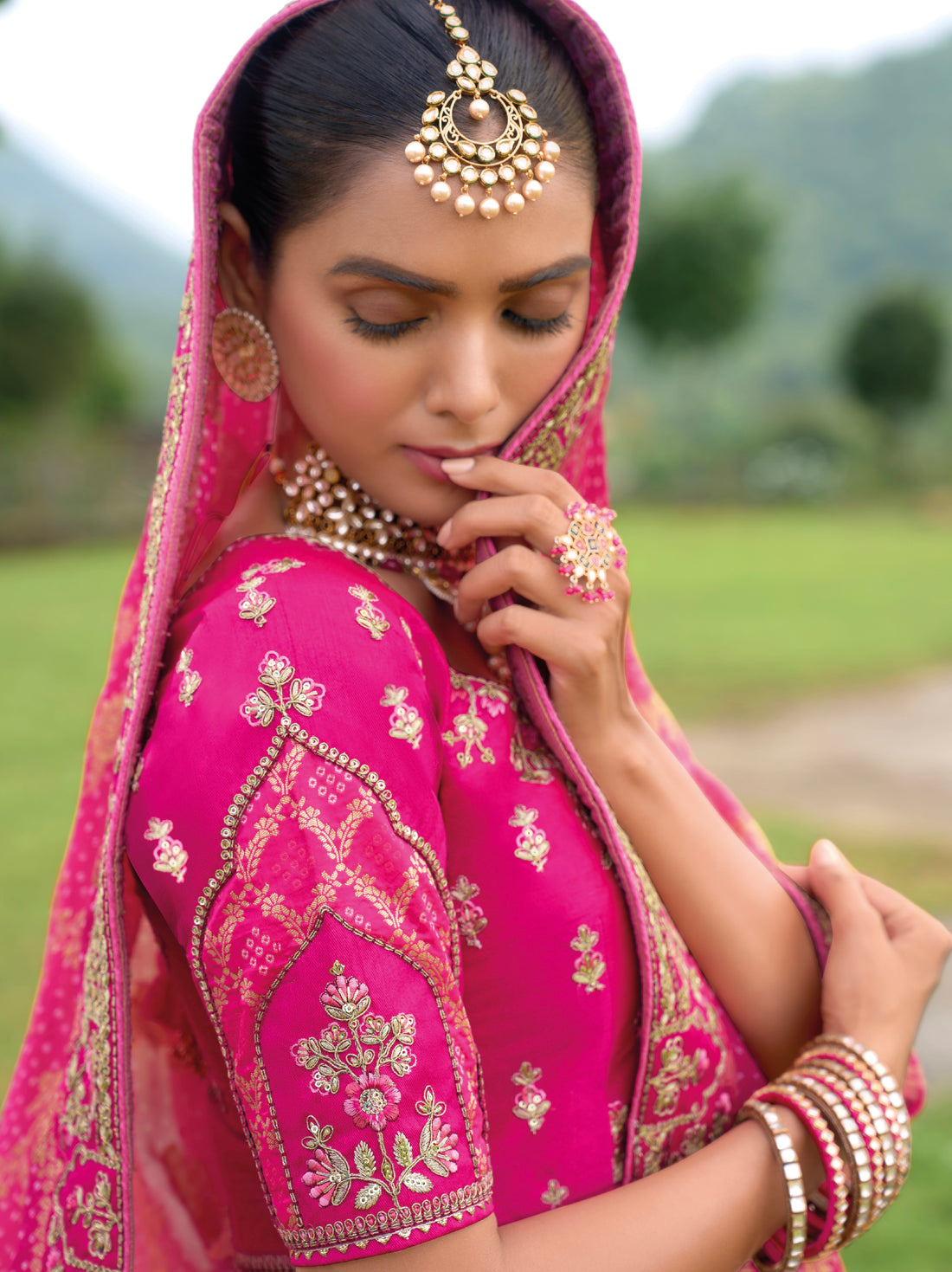 Fuchsia Pink Bridal Lehenga with Heavy Floral Embroidery