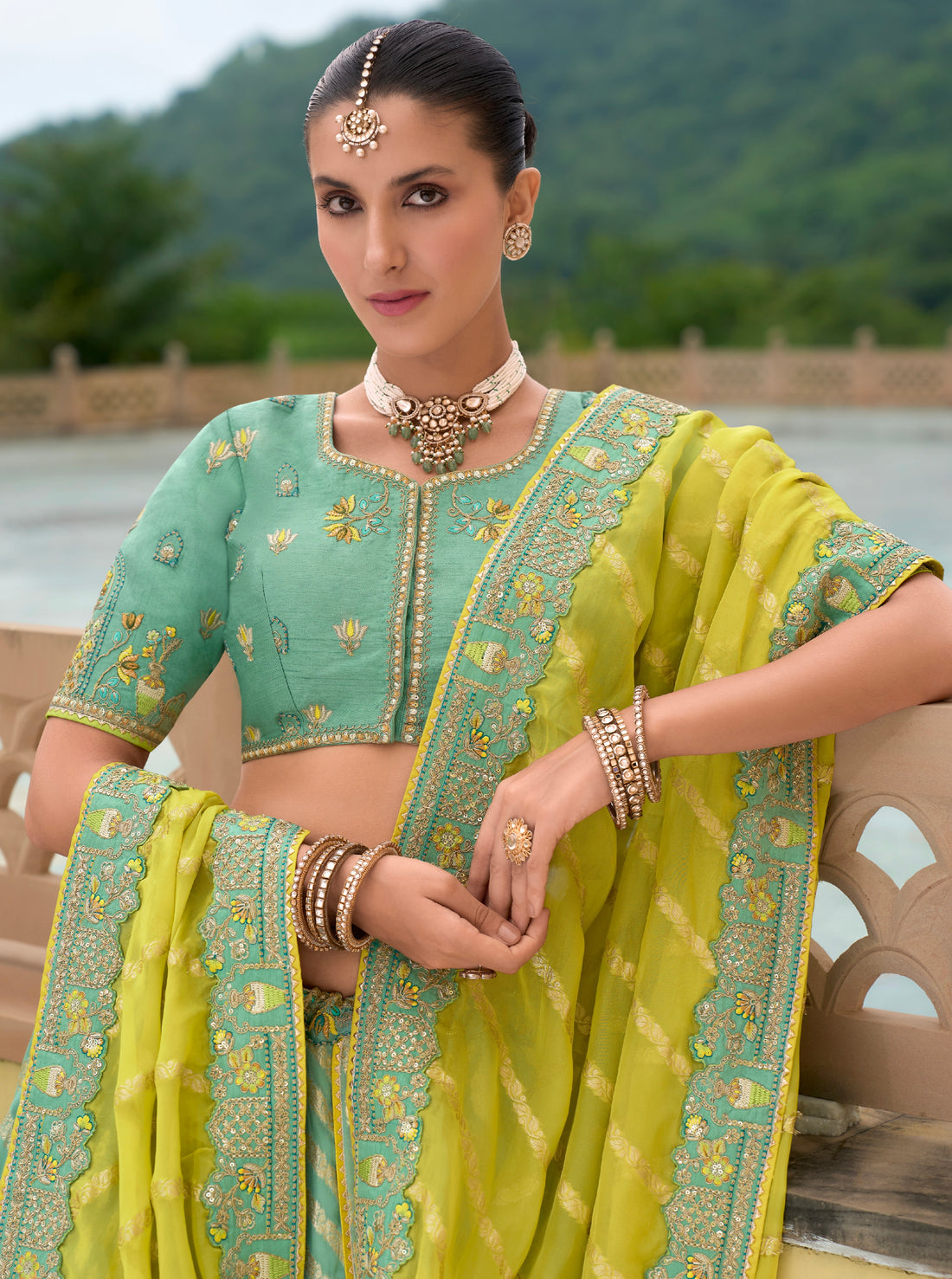 Mint Green and Yellow Silk Lehenga with Intricate Embroidery