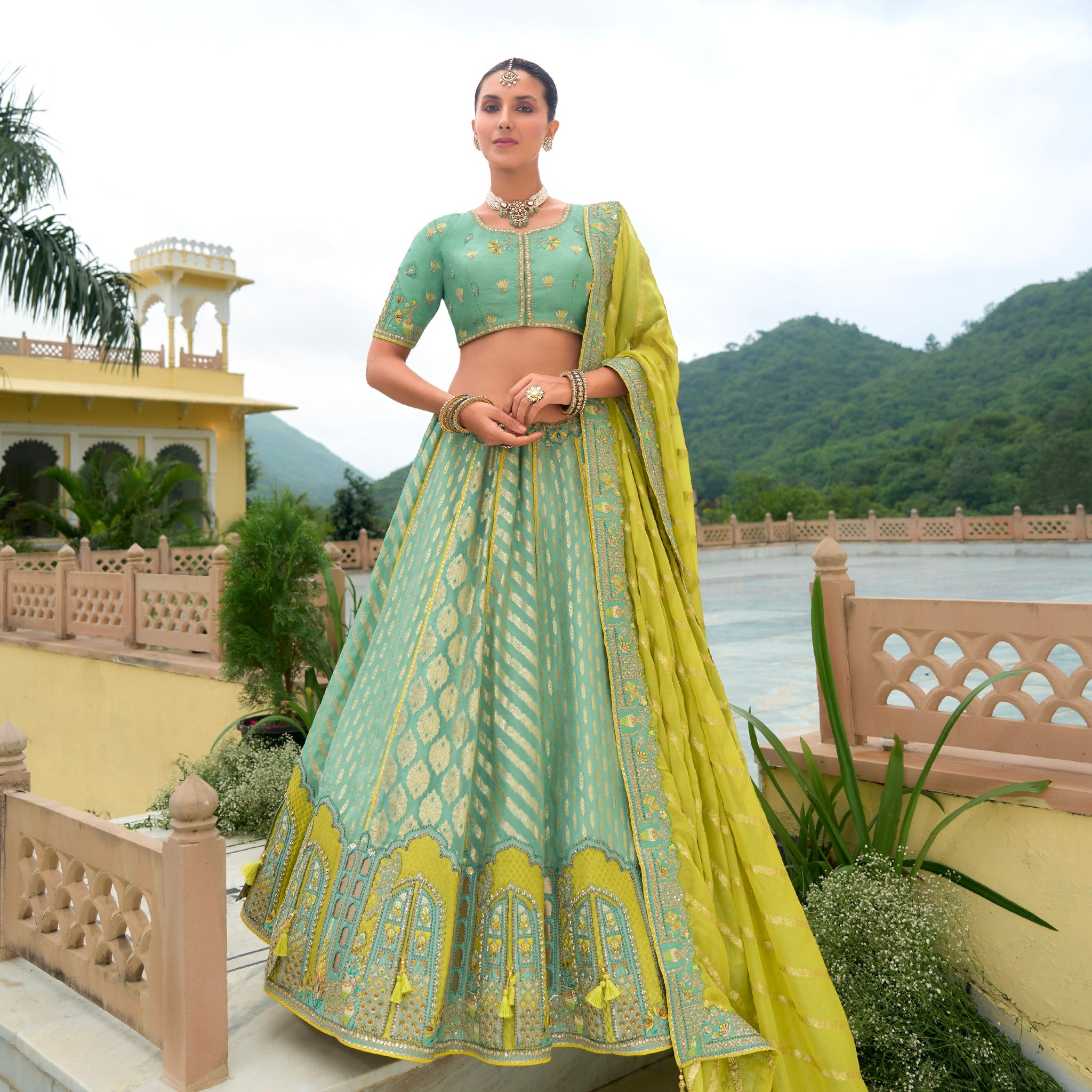 Mint Green and Yellow Silk Lehenga with Intricate Embroidery