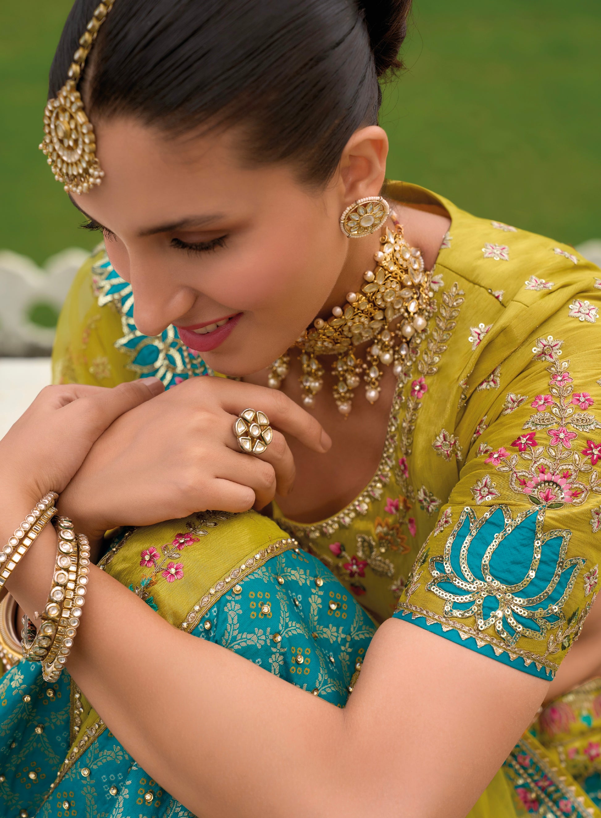 Yellow and Teal Lehenga with Elaborate Khatli Work