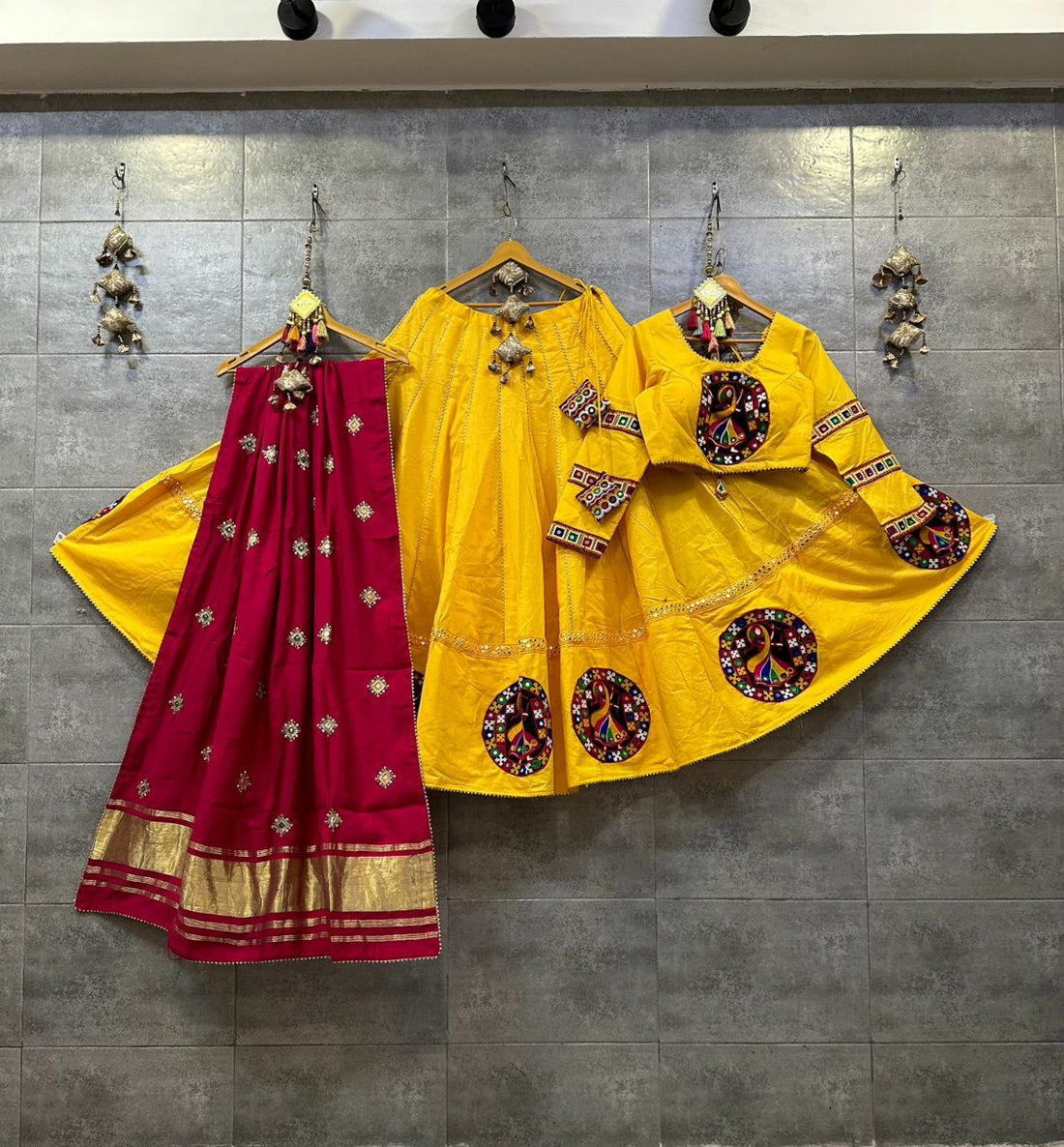 Yellow Camric Cotton Chaniya Choli with Gamthi Patch Work and Pink Semi Gaji Dupatta