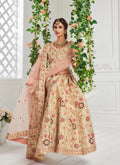 Elegant beige silk lehenga choli with heavy zari, thread embroidery, velvet patch, and zarkan work.