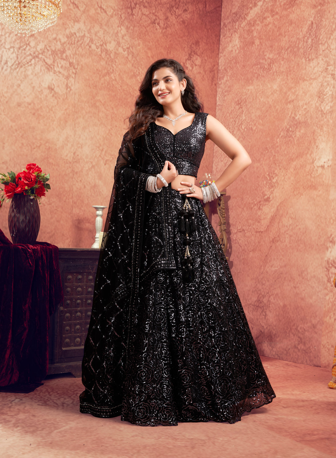 Blossom Black Net Lehenga Choli with Heavy Sequins Embellishments