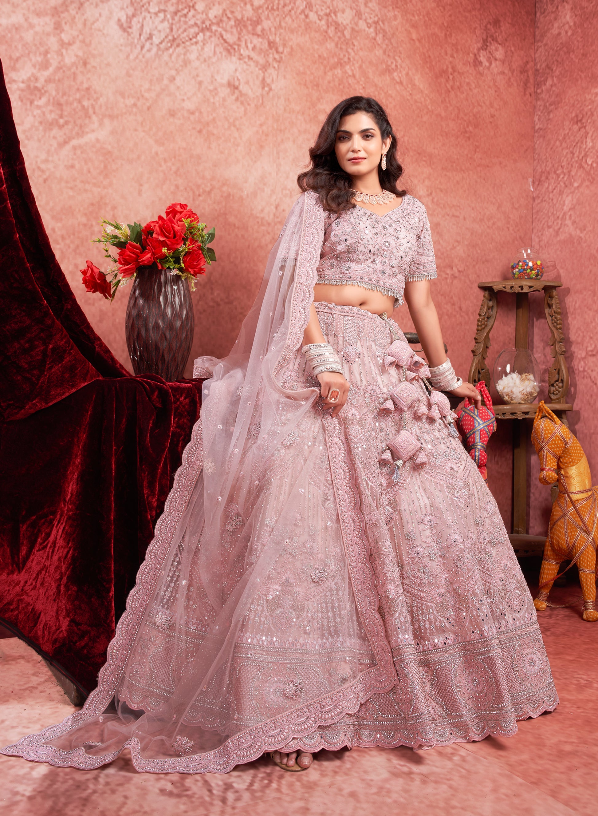 Pink Premium Net Bridal Lehenga with Handcrafted and Heavy Flair