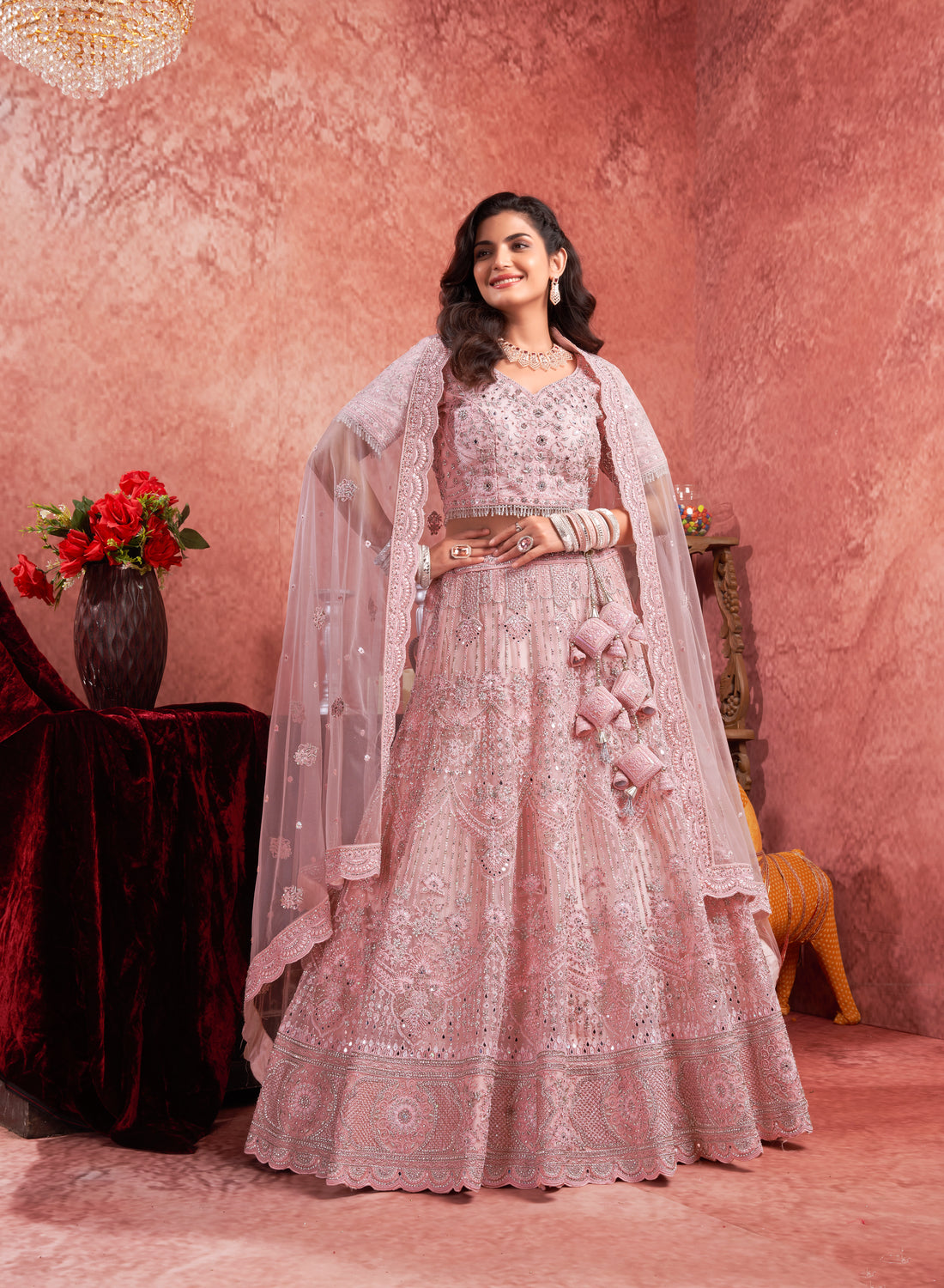 Pink Premium Net Bridal Lehenga with Handcrafted and Heavy Flair