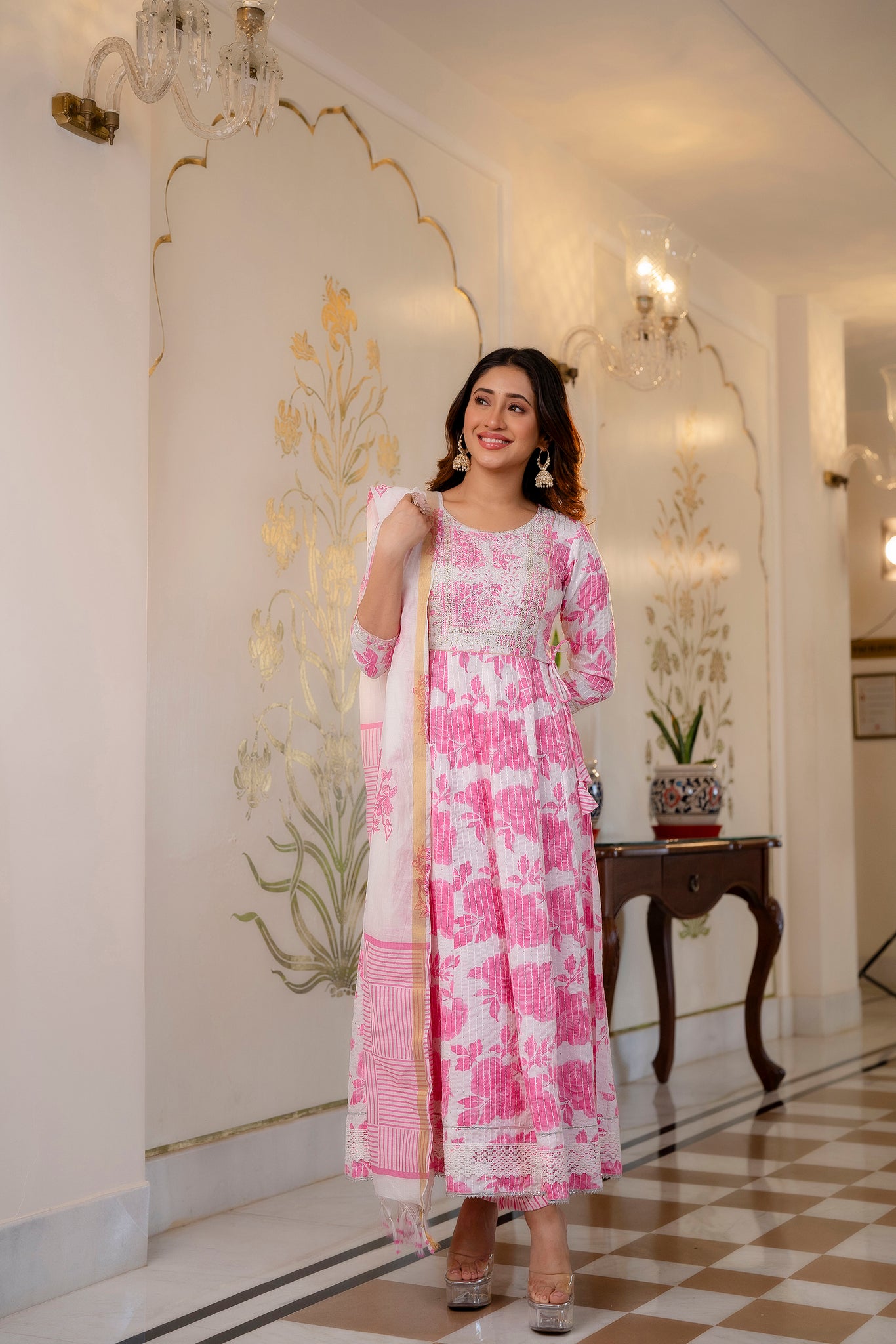 Woman wearing Pink and White Printed Viscose Rayon Kurti, Pant, and Dupatta Set

