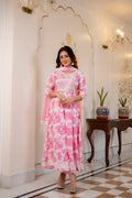 Woman wearing Pink and White Printed Viscose Rayon Kurti, Pant, and Dupatta Set

