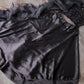 black color organza dupatta with a satin lehenga Anant Tex Exports Private Limited
